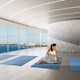 Calming yoga in the clouds inside the Aria on the Bay