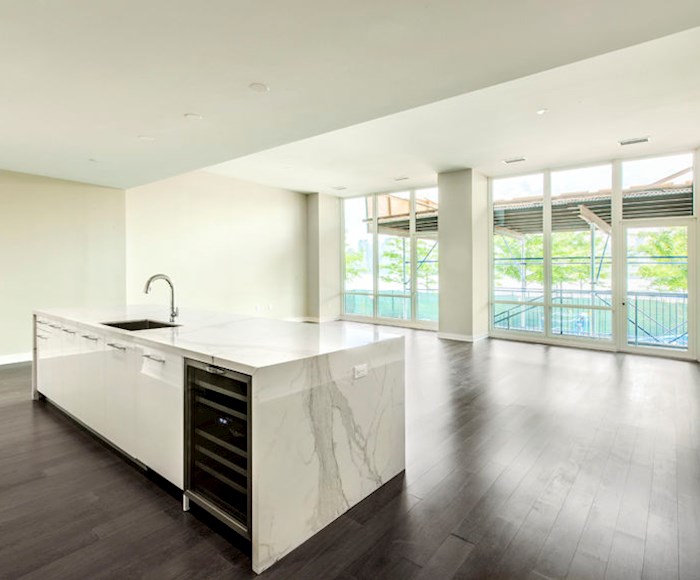 A dining hall in the The Avenue Collection 1200 Condominium